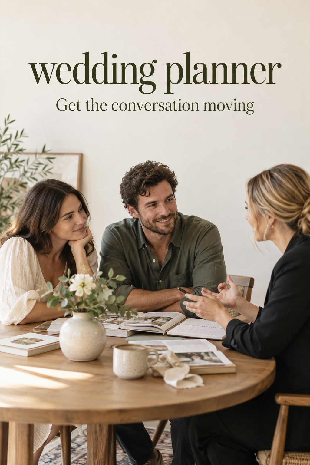 Engaged couple talking with a wedding planner over notes at a round table